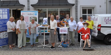 Tätigkeiten von Diakonischem Werk und Kirchengemeinde - Informationen auf dem Wochenmarkt
